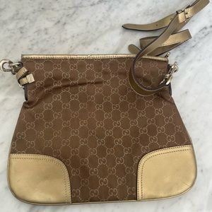 Gucci Hobo Bag with Metallic Gold Leather
